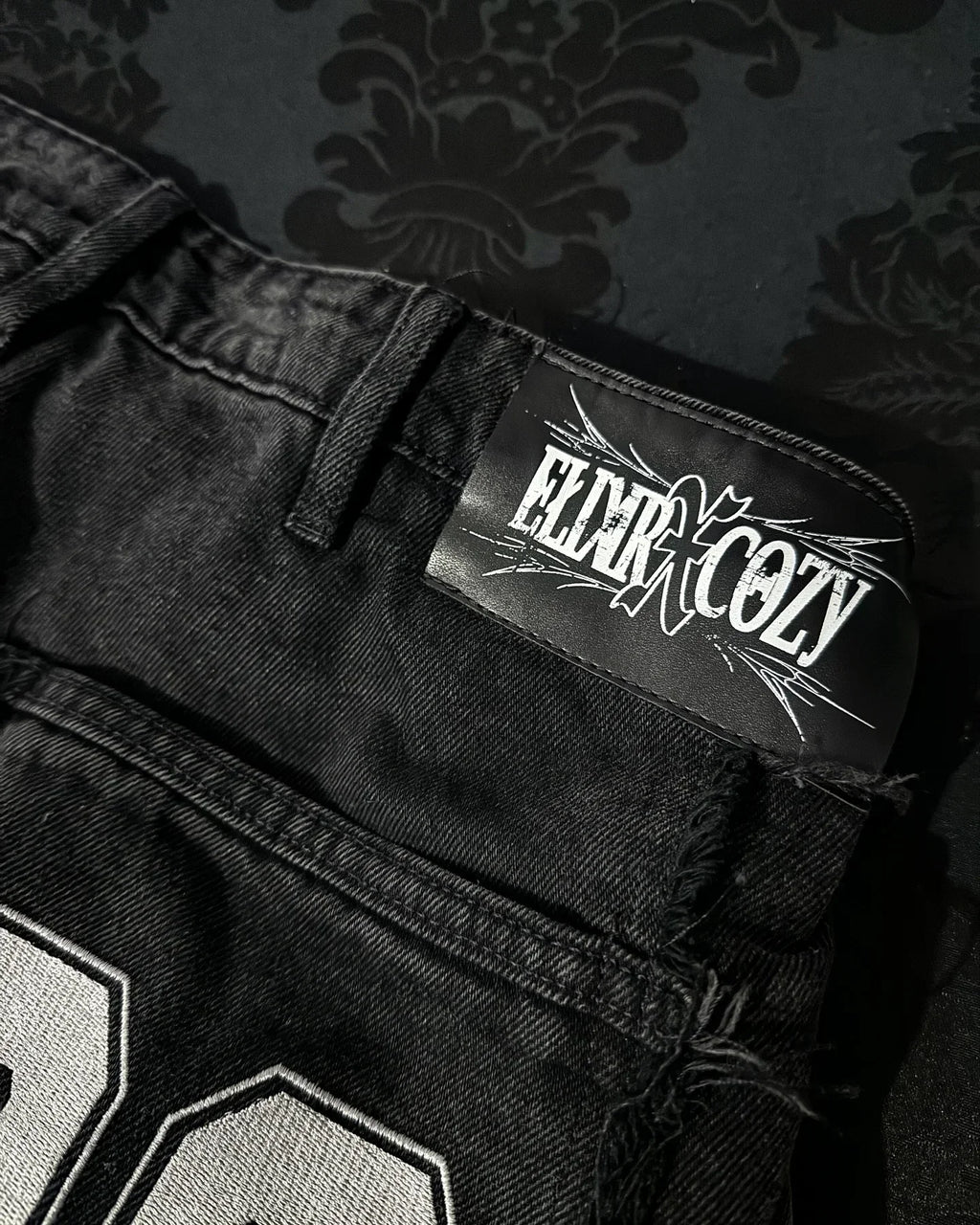 Men's Black Patchwork Embroidered Zipper-Panel Baggy Jeans
